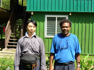 Photo with Dr. D in front of his house